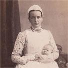 Unidentified nurse and baby